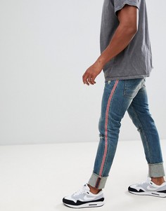 Супероблегающие джинсы с прорехами и полосками по бокам ASOS DESIGN - Синий