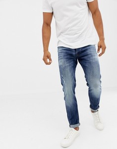 Синие суженные книзу джинсы с выбеленным эффектом Jack & Jones - Синий