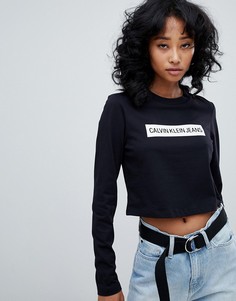 Укороченный лонгслив с логотипом в полоску Calvin Klein Jeans - Черный