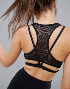 Спортивный бюстгальтер с лямками на спине ASOS 4505 - Черный