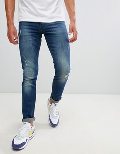 Зауженные джинсы стретч с 5 карманами и потертостями Armani Exchange J14 - Синий