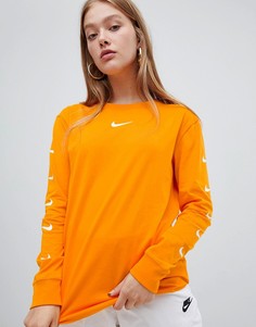 Лонгслив с логотипом на рукаве Nike - Оранжевый