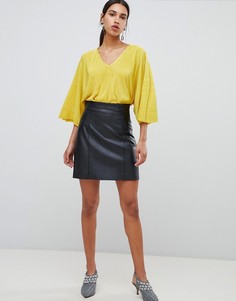 Черная мини-юбка из искусственной кожи River Island - Черный