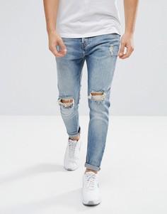 Синие джинсы-морковки с рваной отделкой Pull&Bear - Синий