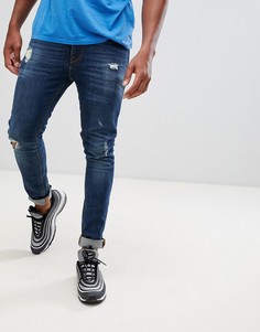 Темно-синие джинсы скинни с рваной отделкой ASOS DESIGN - Синий
