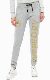 Хлопковые джоггеры с золотистым принтом Superdry