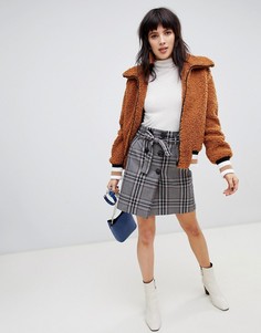 Мини-юбка в клетку с поясом Stradivarius - Черный