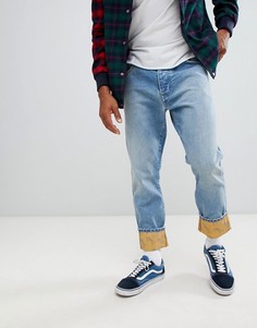 Сине-желтые зауженные джинсы Wrangler - Темно-синий