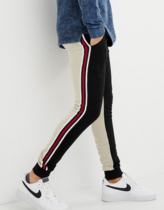 Облегающие джоггеры в стиле колор блок с полосками по бокам ASOS DESIGN - Черный