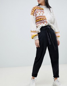 Черные выбеленные суженные книзу джинсы с люверсами на поясе ASOS DESIGN - Черный
