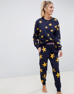 Oversize-джоггеры с принтом звезд и контрастным поясом ASOS DESIGN - Темно-синий