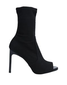 Полусапоги и высокие ботинки Stuart Weitzman