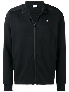 Одежда Le Coq Sportif