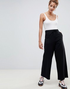 Базовые джоггеры с широкими штанинами ASOS DESIGN - Черный