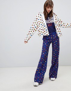 Брюки клеш с принтом Love Moschino - Синий