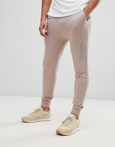 Розовые зауженные джоггеры с карманом в стиле MA1 ASOS DESIGN - Розовый