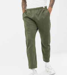 Спортивные штаны оливкового цвета adidas Originals XBYO - Зеленый