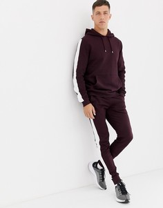 Бордовый спортивный костюм с полосами по бокам ASOS DESIGN - Красный