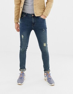 Темно-синие джинсы скинни с рваной отделкой ASOS DESIGN - Синий