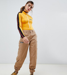 Брюки с карманами и логотипом сбоку Ellesse - Бежевый