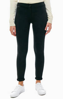 Зауженные черные брюки в классическом стиле Lacoste