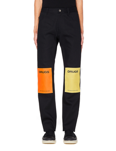 Черные джинсы с патчами RAF Simons