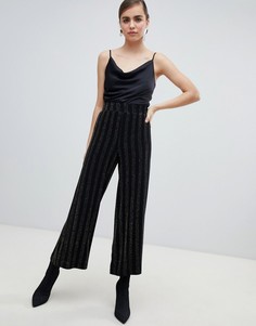 Черные брюки в блестящую полоску с широкими штанинами Monki - Золотой