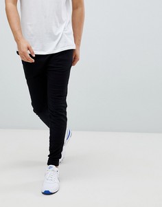 Черные облегающие джоггеры ASOS DESIGN - Черный