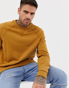 Темно-желтый свитшот с необработанными кромками ASOS DESIGN - Желтый