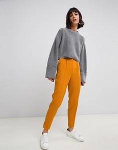 Желтые суженные книзу брюки ASOS DESIGN - Желтый