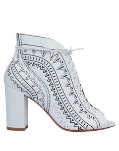 Полусапоги и высокие ботинки Santoni