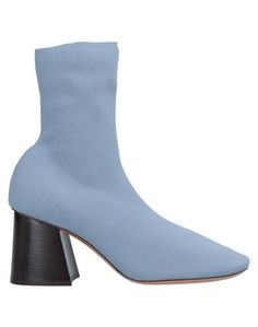 Полусапоги и высокие ботинки CÉline