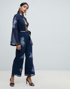 Комбинезон с вырезом капелькой и цветочной вышивкой в стиле 70-х ASOS DESIGN - Темно-синий