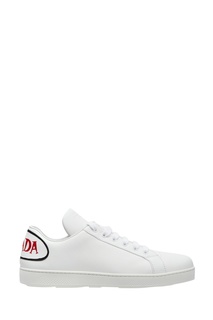 Белые кеды с логотипом Prada