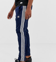 Спортивные штаны с кнопками adidas Originals - Темно-синий