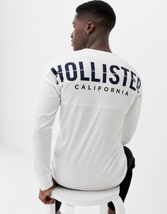 Белый лонгслив с круглым вырезом и логотипом на спине Hollister - Белый