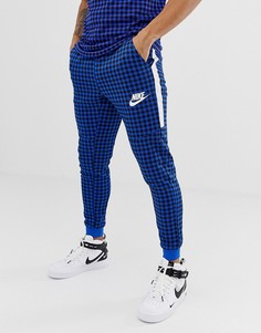 Синие джоггеры в клетку Nike BQ0676-480 - Синий