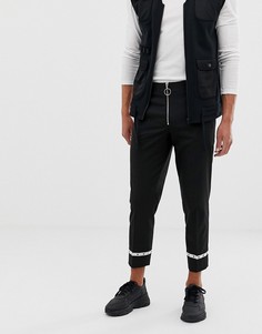 Черные укороченные брюки узкого кроя с люверсами ASOS DESIGN - Черный
