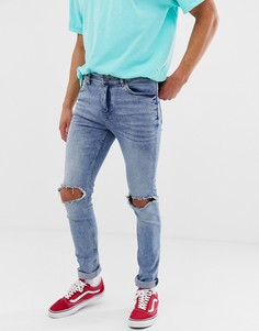 Синие зауженные джинсы с рваными коленями Cheap Monday - Синий