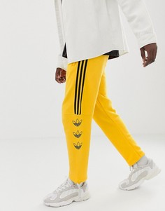 Желтые джоггеры в полоску с логотипом-трилистником adidas Originals DV3149 - Желтый