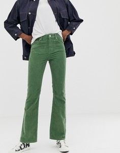 Вельветовые расклешенные брюки ASOS DESIGN - Зеленый