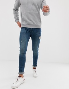 Зеленые джинсы скинни с потертостями ASOS DESIGN - Синий