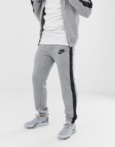 Серые джоггеры с полосками Nike BQ0679-063 - Серый