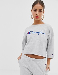 Свободный кроп-топ с логотипом Champion - Серый