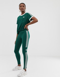 Зеленые леггинсы с тремя полосками adidas Originals adicolor - Зеленый