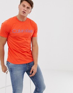 Оранжевая футболка с логотипом Calvin Klein - Оранжевый