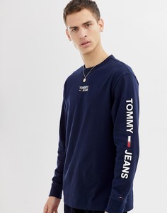 Темно-синий лонгслив классического кроя с логотипом на груди и рукаве Tommy Jeans - Темно-синий