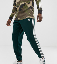 Спортивные брюки с тремя полосками adidas Originals - Зеленый