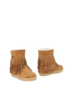 Полусапоги и высокие ботинки Tory Burch