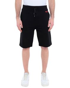Пляжные брюки и шорты Moschino
